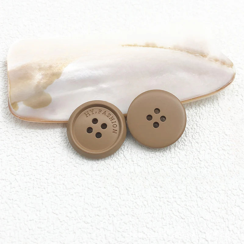 Color matte resin buttons men's and women's trench coat buttons coat buttons suit buttons four-eye buttons spot