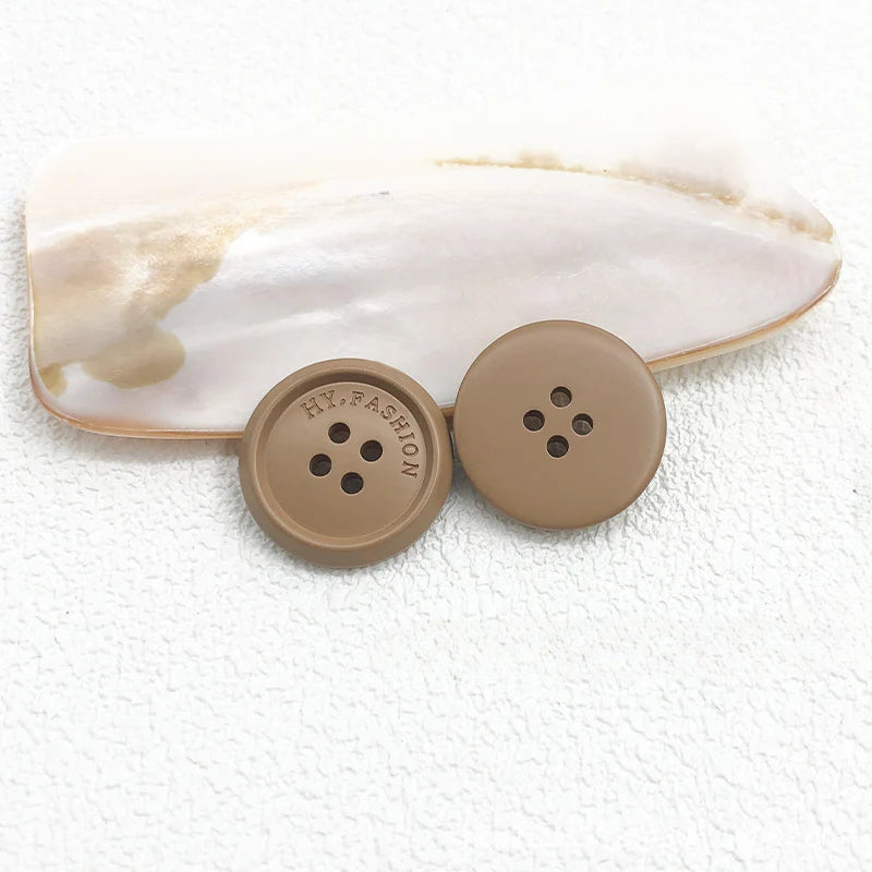 Color matte resin buttons men's and women's trench coat buttons coat buttons suit buttons four-eye buttons spot