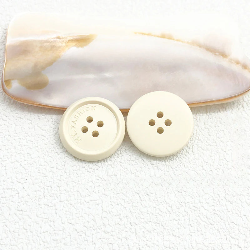 Color matte resin buttons men's and women's trench coat buttons coat buttons suit buttons four-eye buttons spot