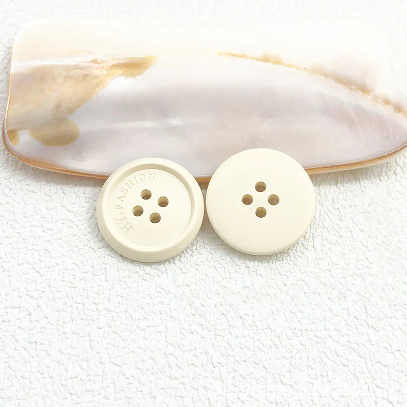 Color matte resin buttons men's and women's trench coat buttons coat buttons suit buttons four-eye buttons spot
