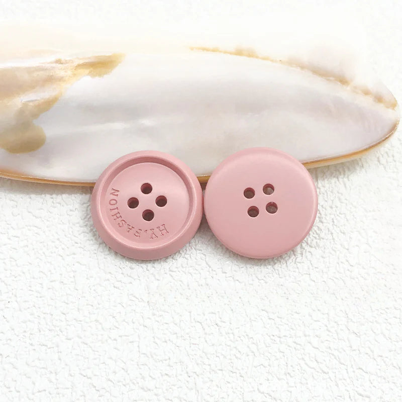 Color matte resin buttons men's and women's trench coat buttons coat buttons suit buttons four-eye buttons spot