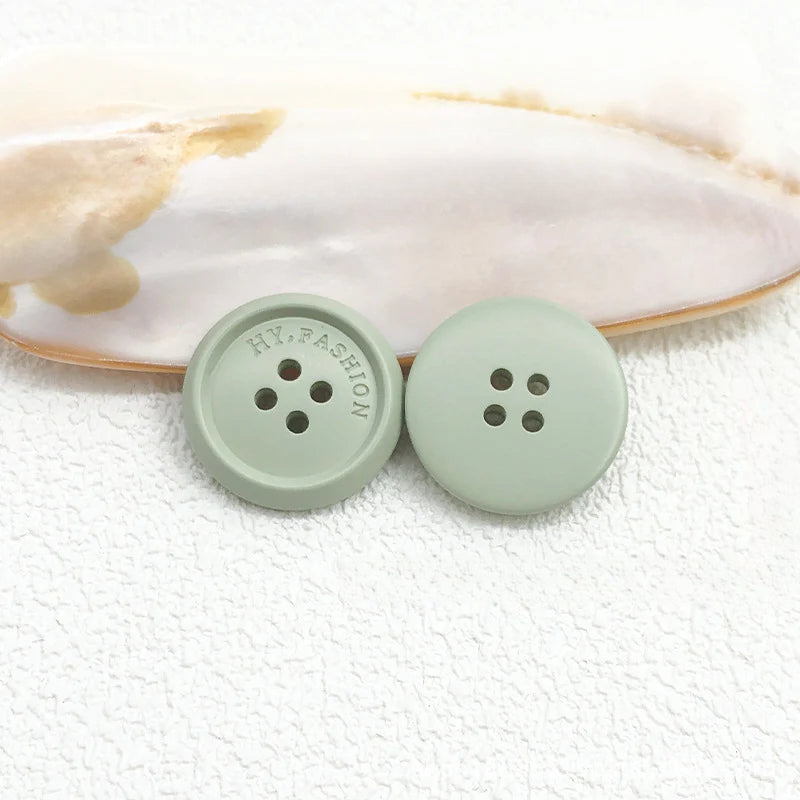 Color matte resin buttons men's and women's trench coat buttons coat buttons suit buttons four-eye buttons spot