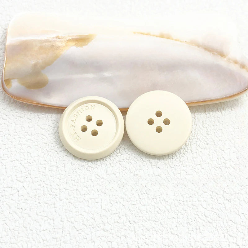 Color matte resin buttons men's and women's trench coat buttons coat buttons suit buttons four-eye buttons spot