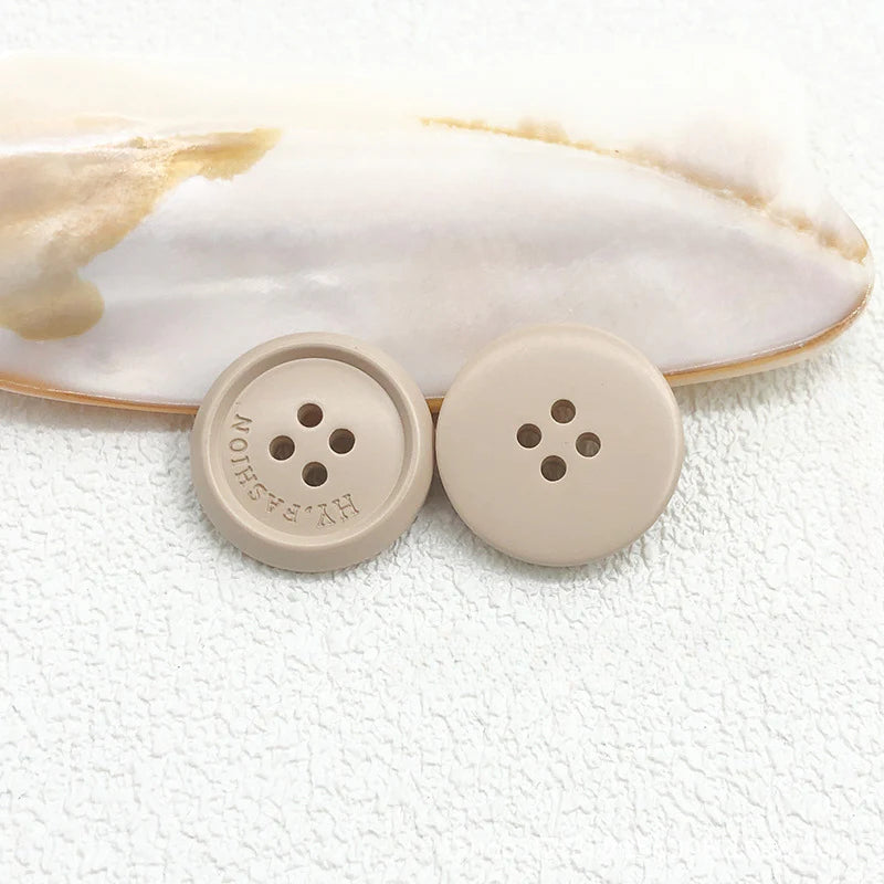Color matte resin buttons men's and women's trench coat buttons coat buttons suit buttons four-eye buttons spot