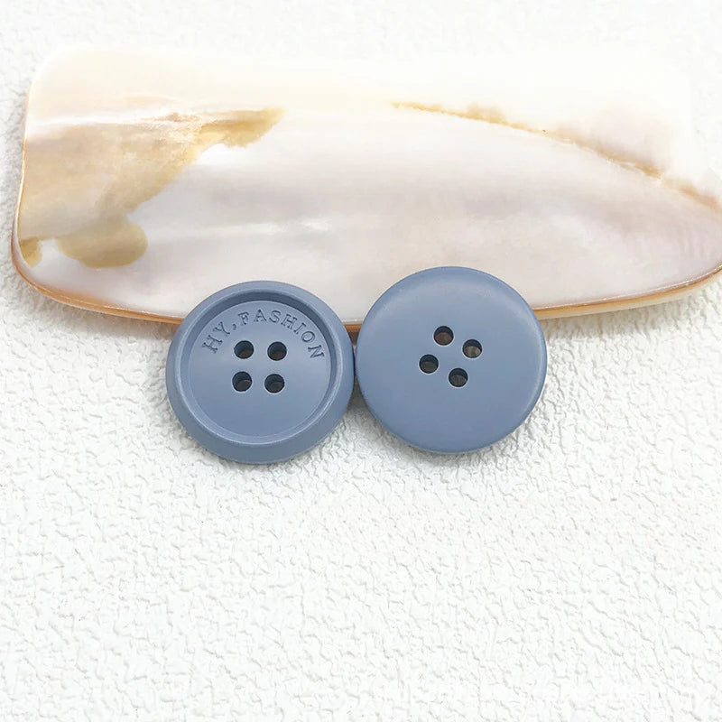 Color matte resin buttons men's and women's trench coat buttons coat buttons suit buttons four-eye buttons spot