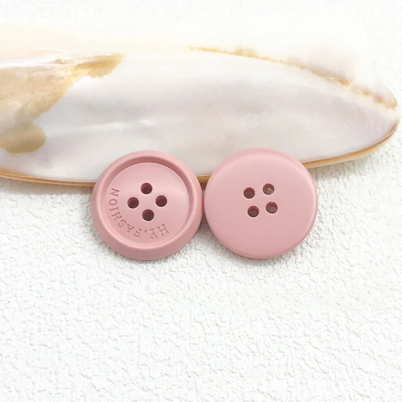 Color matte resin buttons men's and women's trench coat buttons coat buttons suit buttons four-eye buttons spot